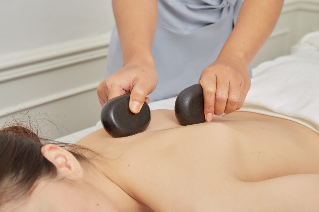What is used in hot stone massage?